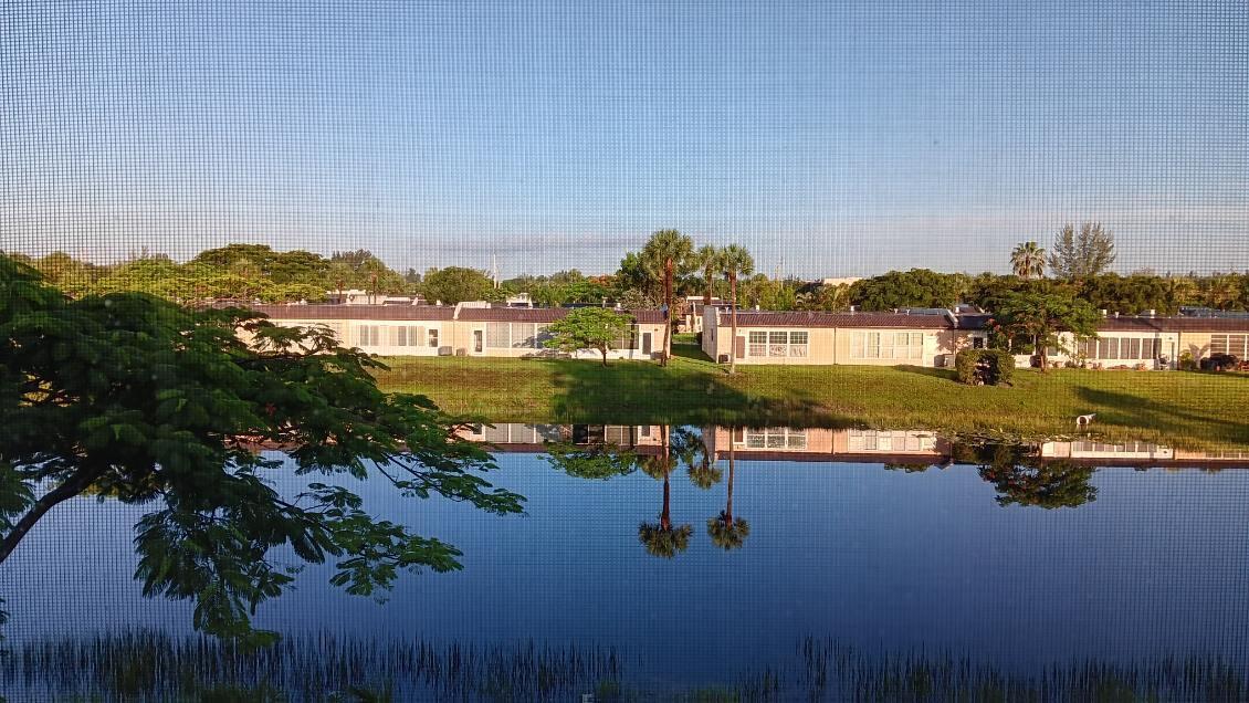 154 Lake Meryl Drive, Unit 257 West Palm Beach, FL 33411 - Photo 18 of 25 a view of lake with city view