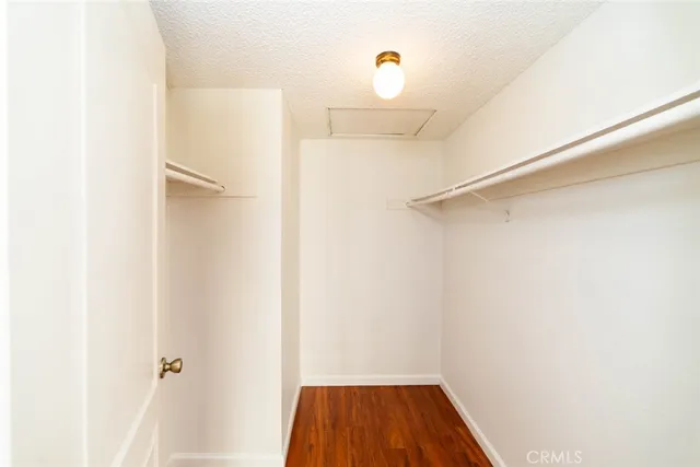 a view of a bathroom with a sink and a mirror