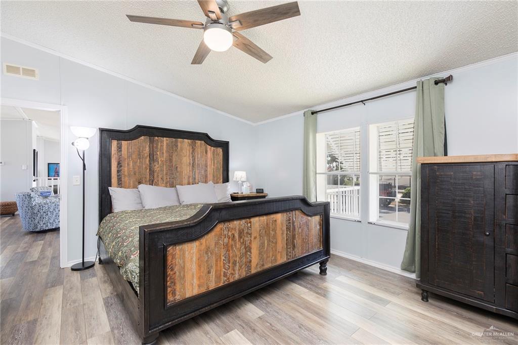 1034 Santa Maria Street Mercedes, TX 78570 - Photo 15 of 25 a bedroom with a bed and window