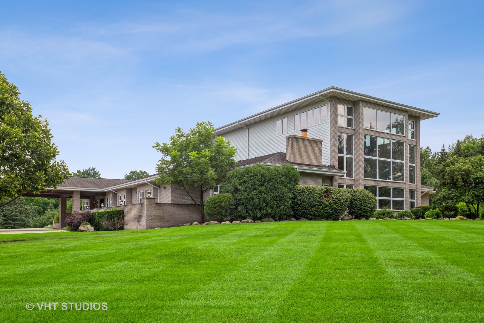 33W859 Fletcher Road Wayne, IL 60174 - Photo 81 of 110 a front view of a house with a yard and trees