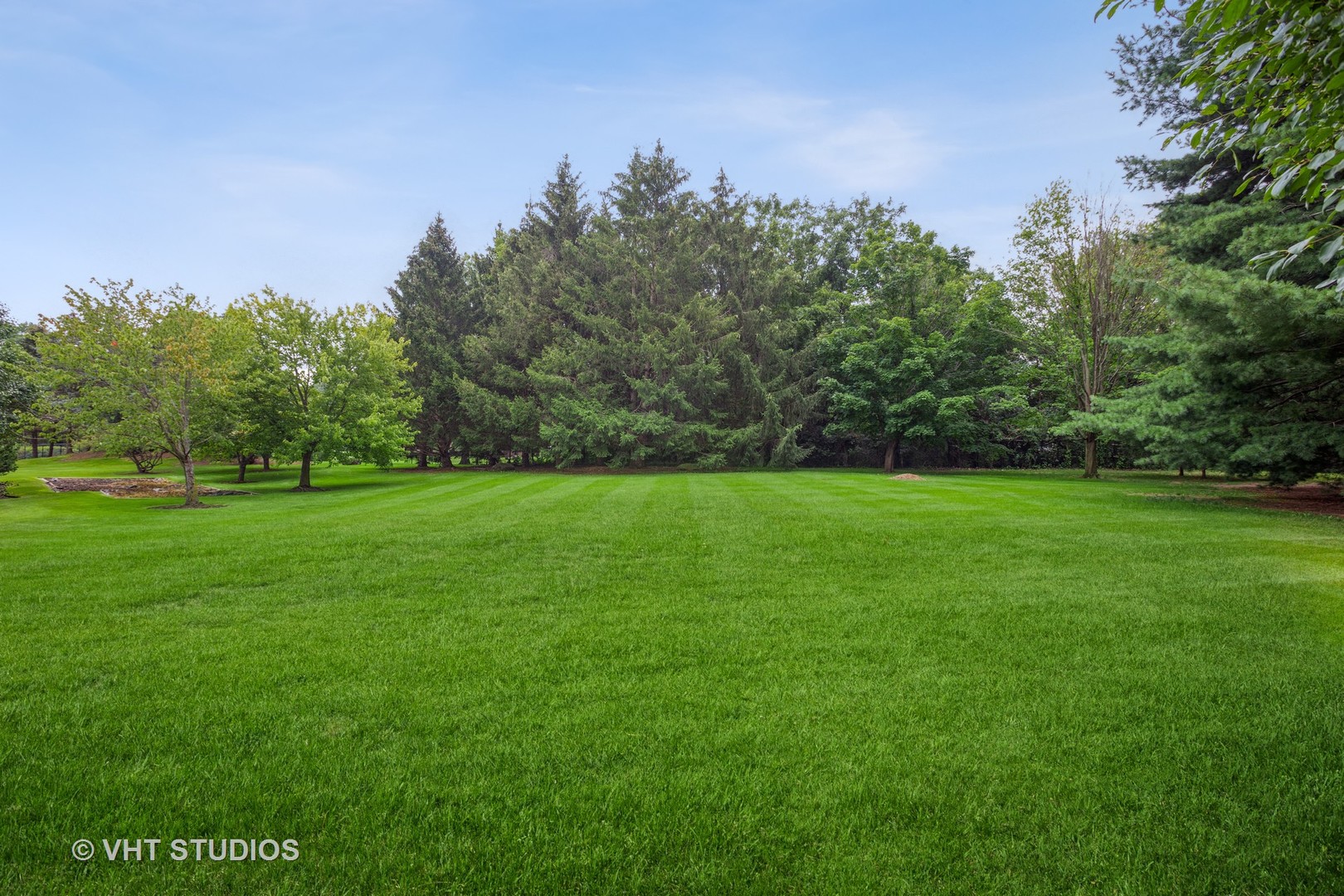 33W859 Fletcher Road Wayne, IL 60174 - Photo 87 of 110 a view of a field of grass and trees