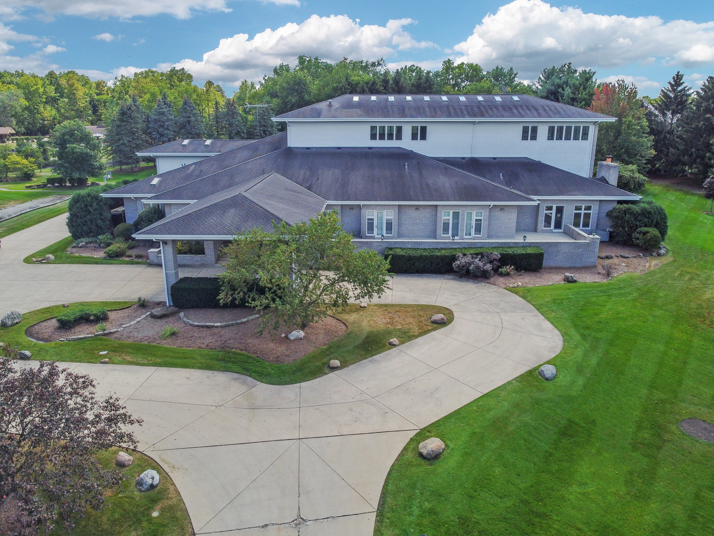 33W859 Fletcher Road Wayne, IL 60174 - Photo 100 of 110 a view of a house with a yard potted plants and a large tree