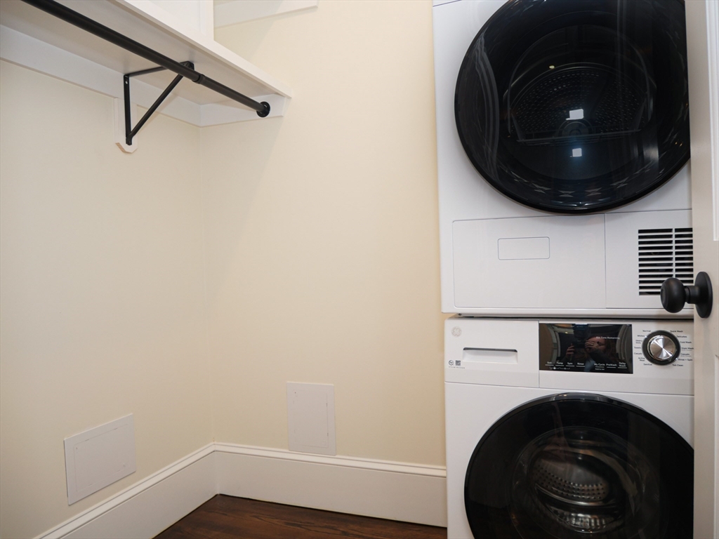 261 West Newton Street, Unit 2 Boston, MA 02116 - Photo 6 of 7 a view of a hallway with washer and dryer