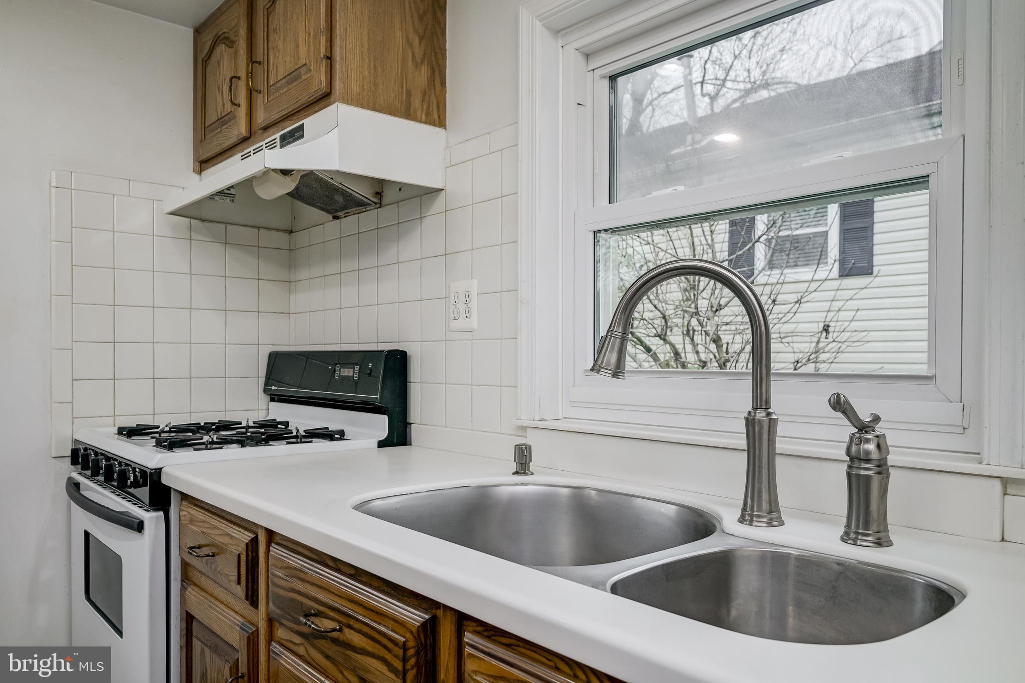1500 Gleason Street Silver Spring, MD 20902 - Photo 8 of 45 Gas cooking, double SS sink & French door Fridge.