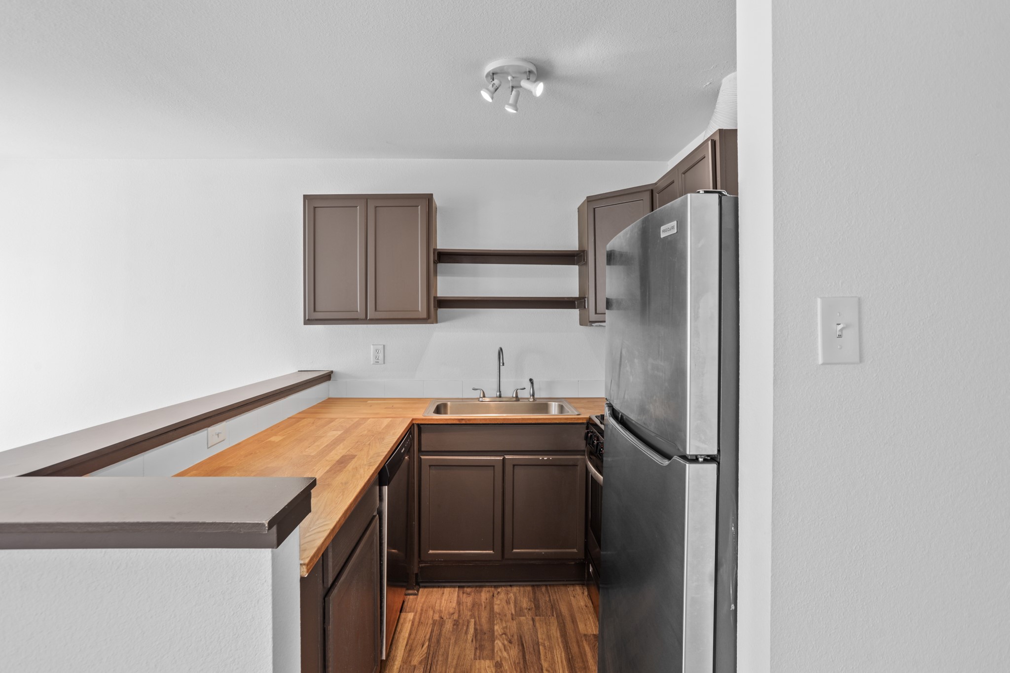 1408 Hughes Street, Unit 4 Houston, TX 77023 - Photo 5 of 27 Butcher block countertops for gourmet food prep.