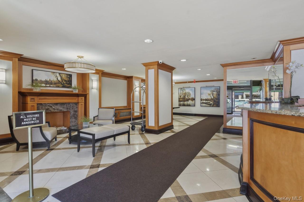 118-18 Union Turnpike, Unit 5F Queens, NY 11415 - Photo 11 of 13 Common area with recessed lighting and ornamental molding