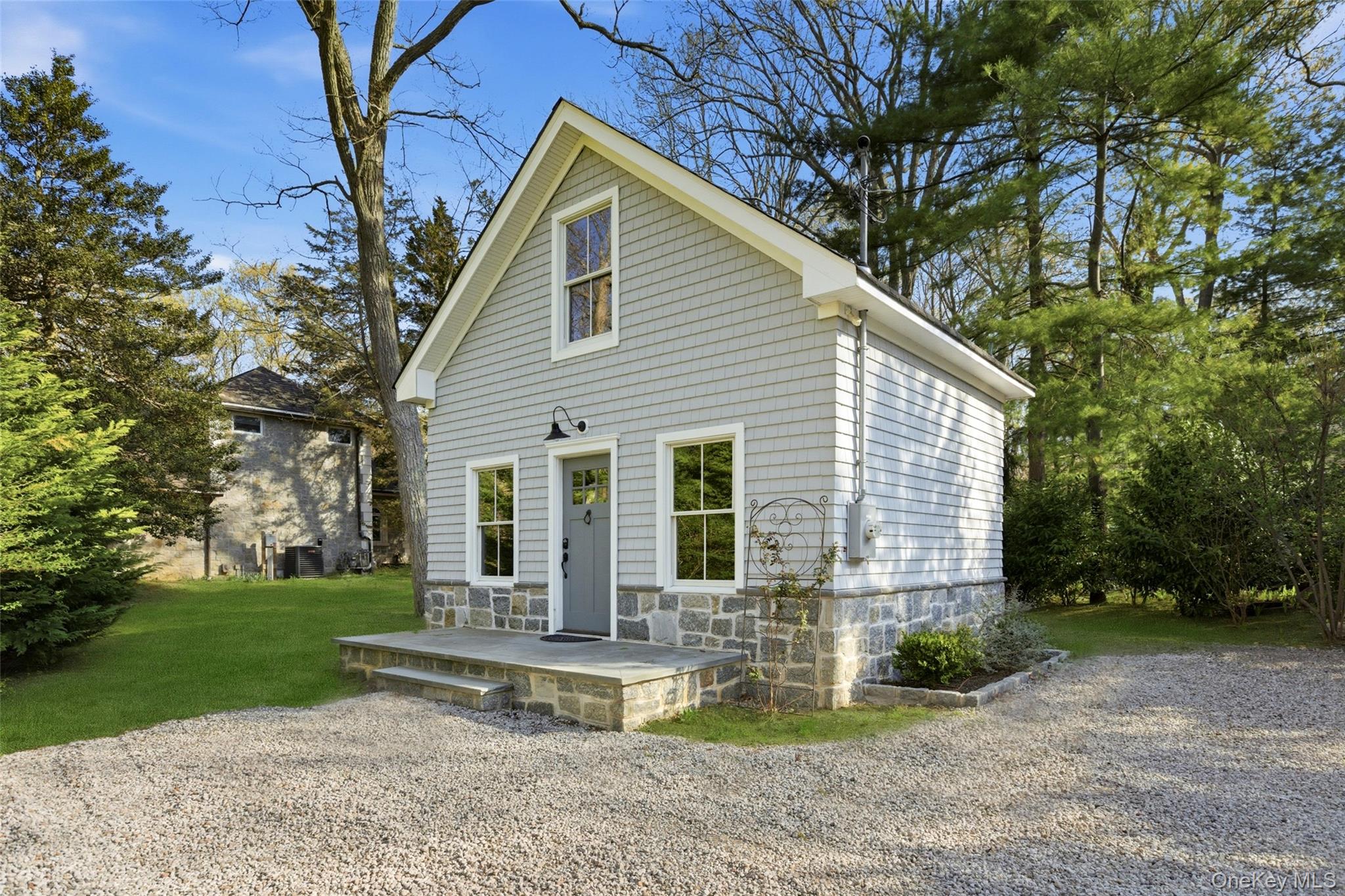 31 West Meadow Road Setauket, NY 11733 - Photo 17 of 28 a view of a house with backyard and sitting area