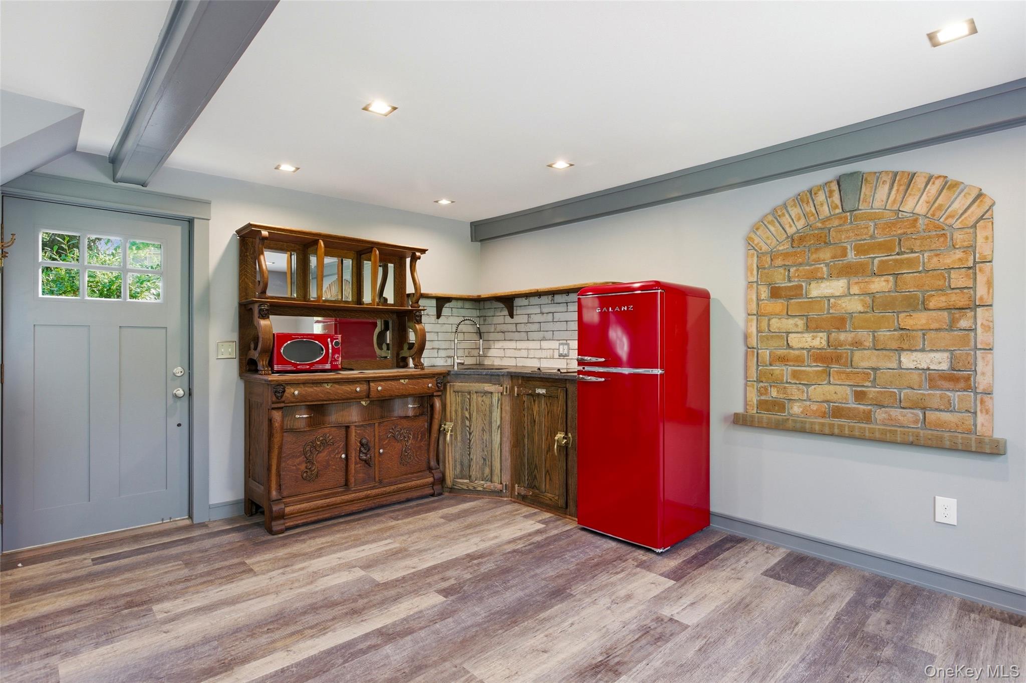 31 West Meadow Road Setauket, NY 11733 - Photo 18 of 28 a kitchen with stainless steel appliances granite countertop a stove a refrigerator and wooden cabinets
