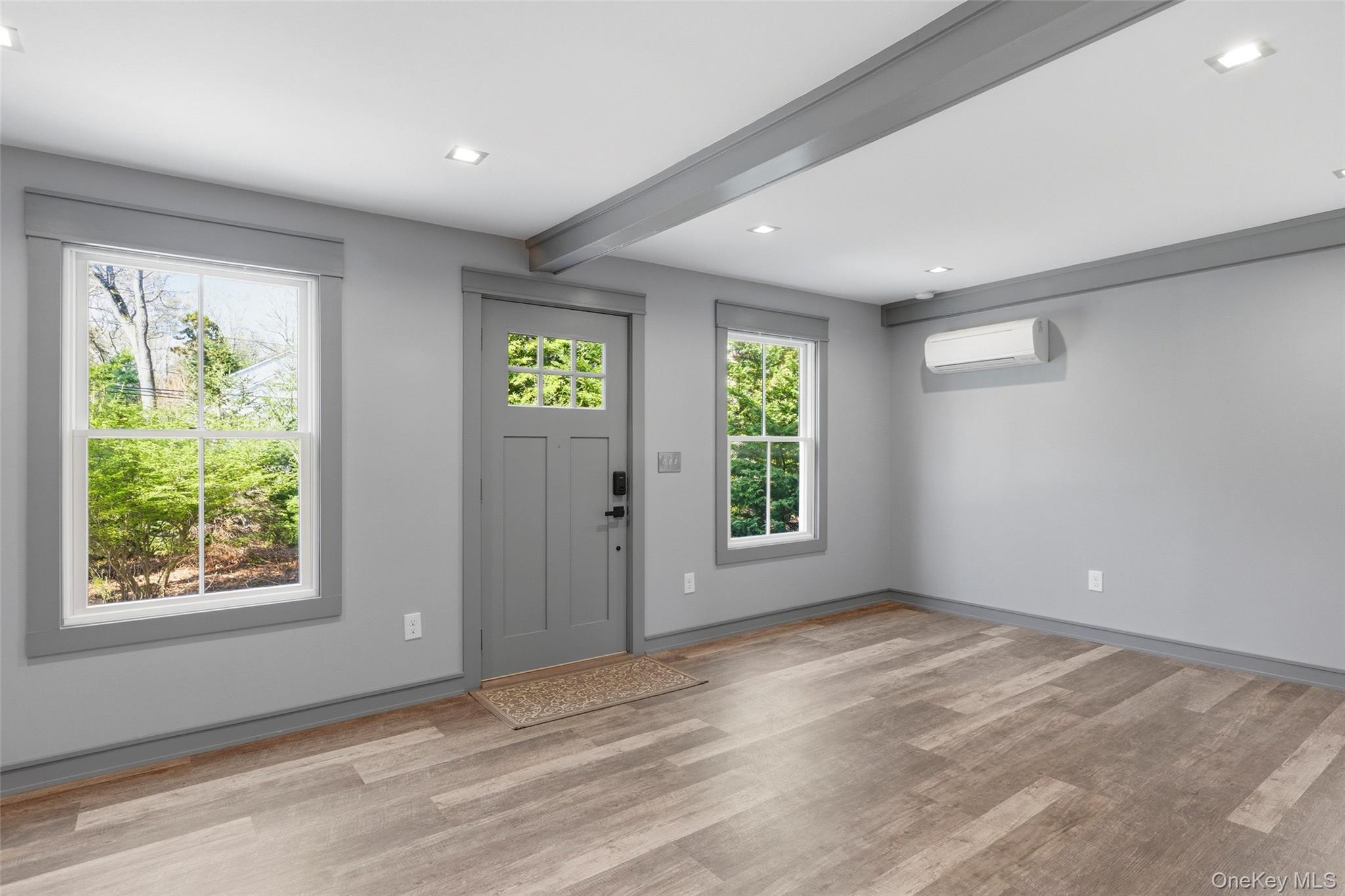 31 West Meadow Road Setauket, NY 11733 - Photo 20 of 28 a view of an empty room with a window