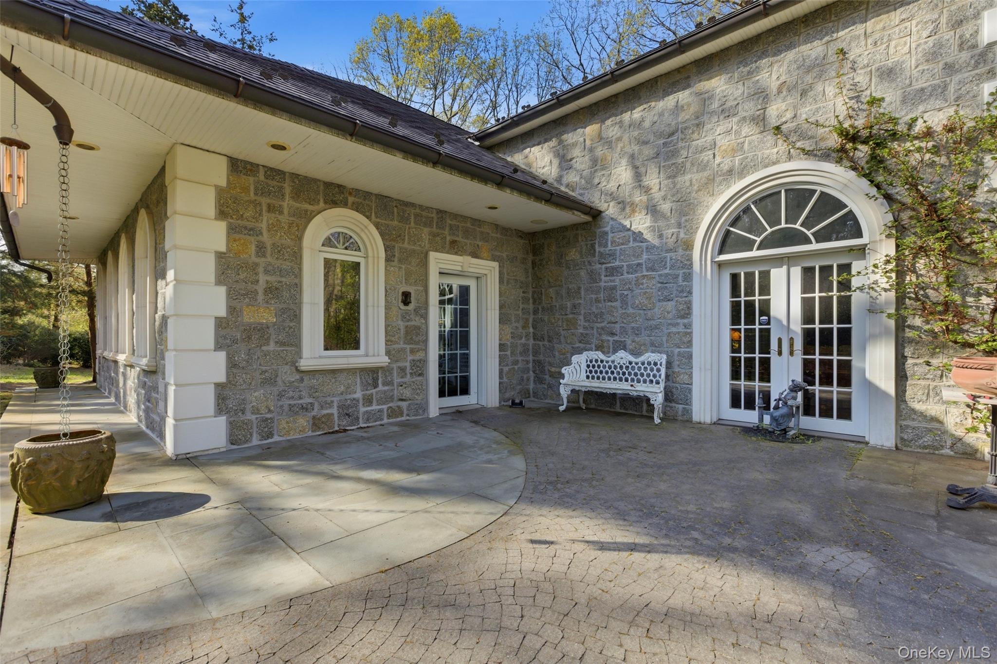 31 West Meadow Road Setauket, NY 11733 - Photo 2 of 28 a view of a brick house with many windows