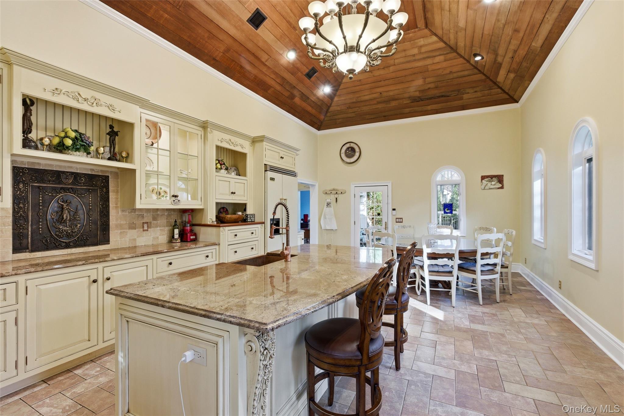 31 West Meadow Road Setauket, NY 11733 - Photo 5 of 28 a kitchen with a table and chairs