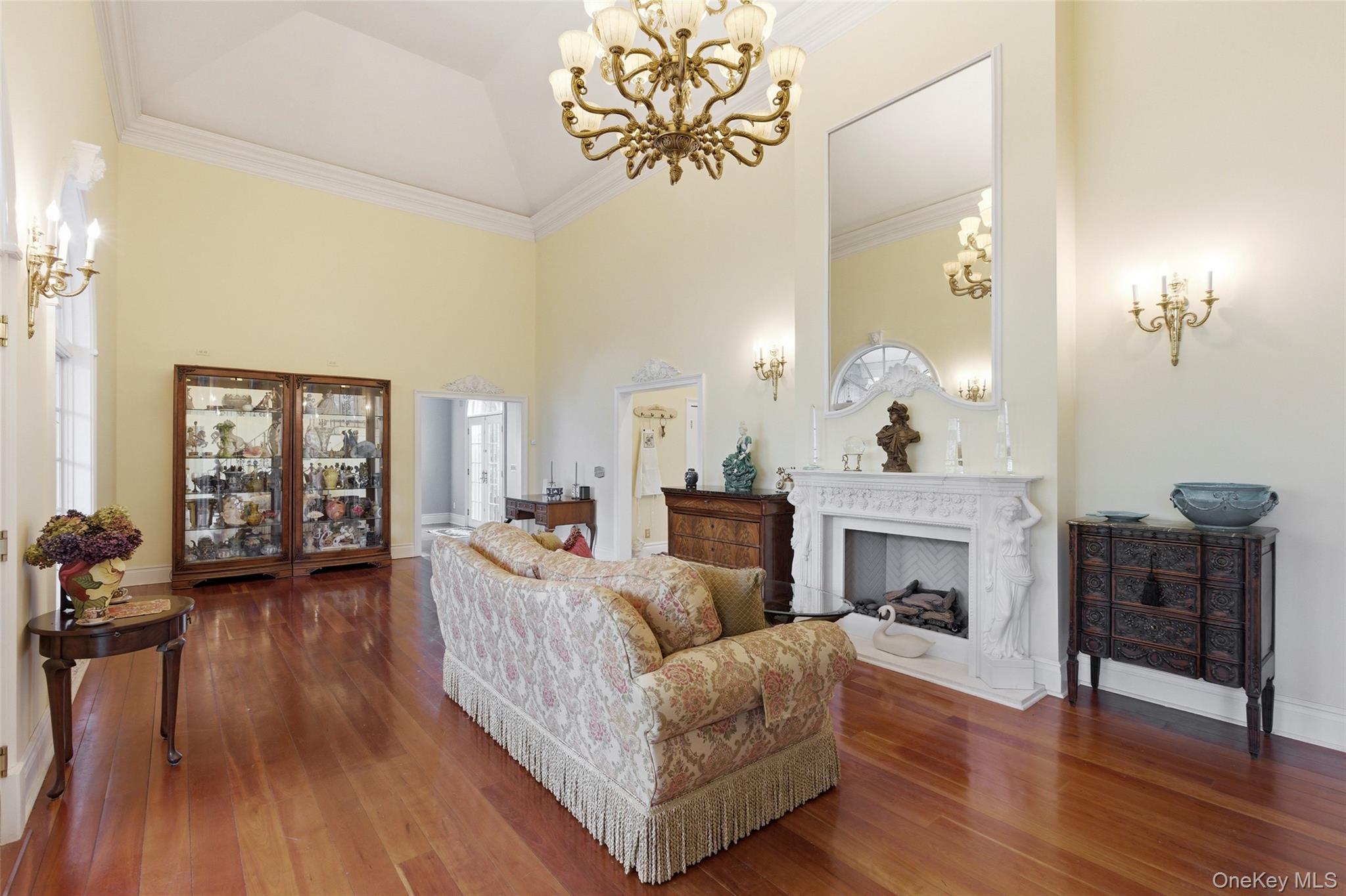 31 West Meadow Road Setauket, NY 11733 - Photo 8 of 28 a living room with furniture and a fireplace