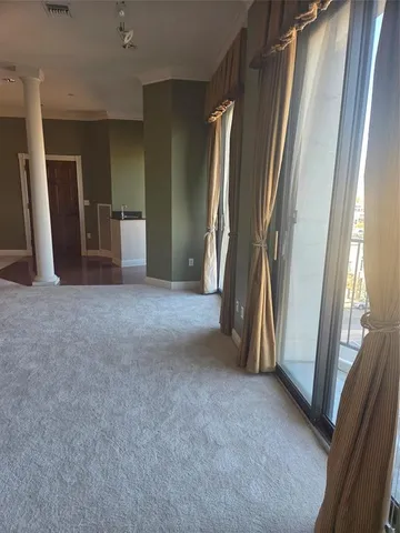 a view of empty room with front door