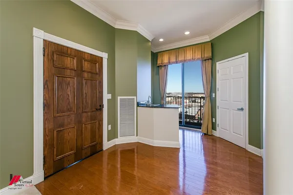 a view of kitchen with furniture and wooden floor