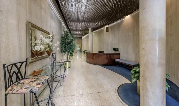 a view of a hallway with workspace