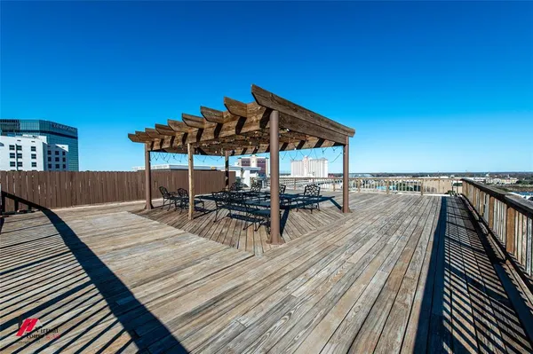 a view of a car is parked on the street