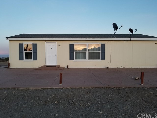 9775 Beekley Road Phelan, CA 92371 - Photo 1 of 1 a view of a house with backyard