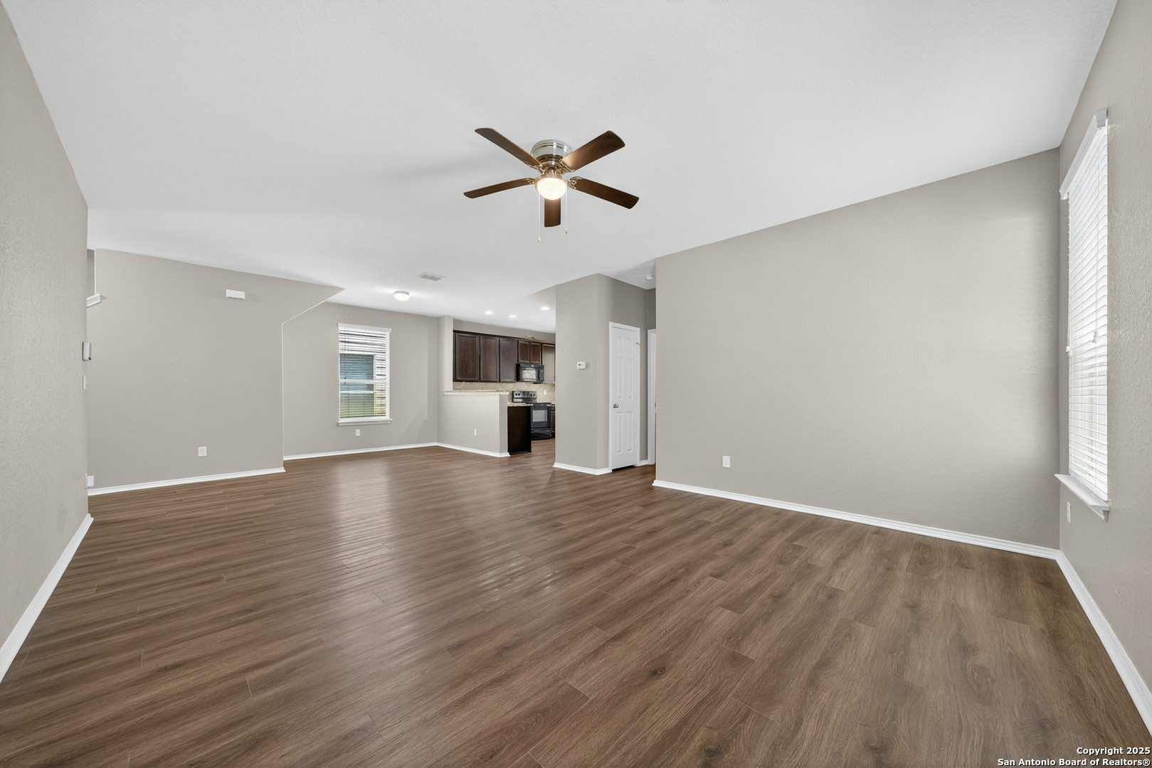 474 Walnut Crest Selma, TX 78154 - Photo 6 of 28 wooden floor in an empty room with a window