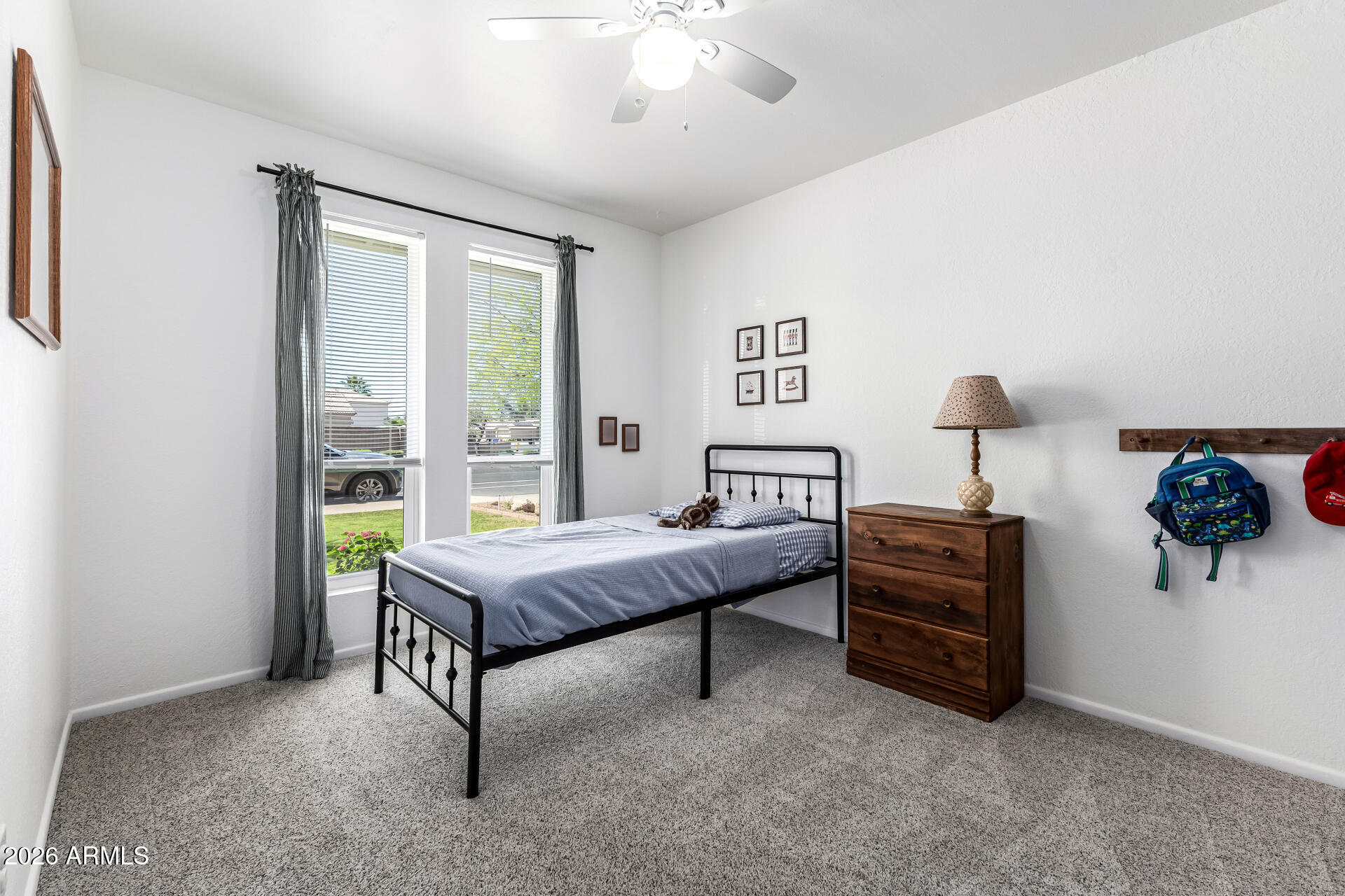 21 South Neely Street Gilbert, AZ 85233 - Photo 17 of 28 a bedroom with furniture and a window