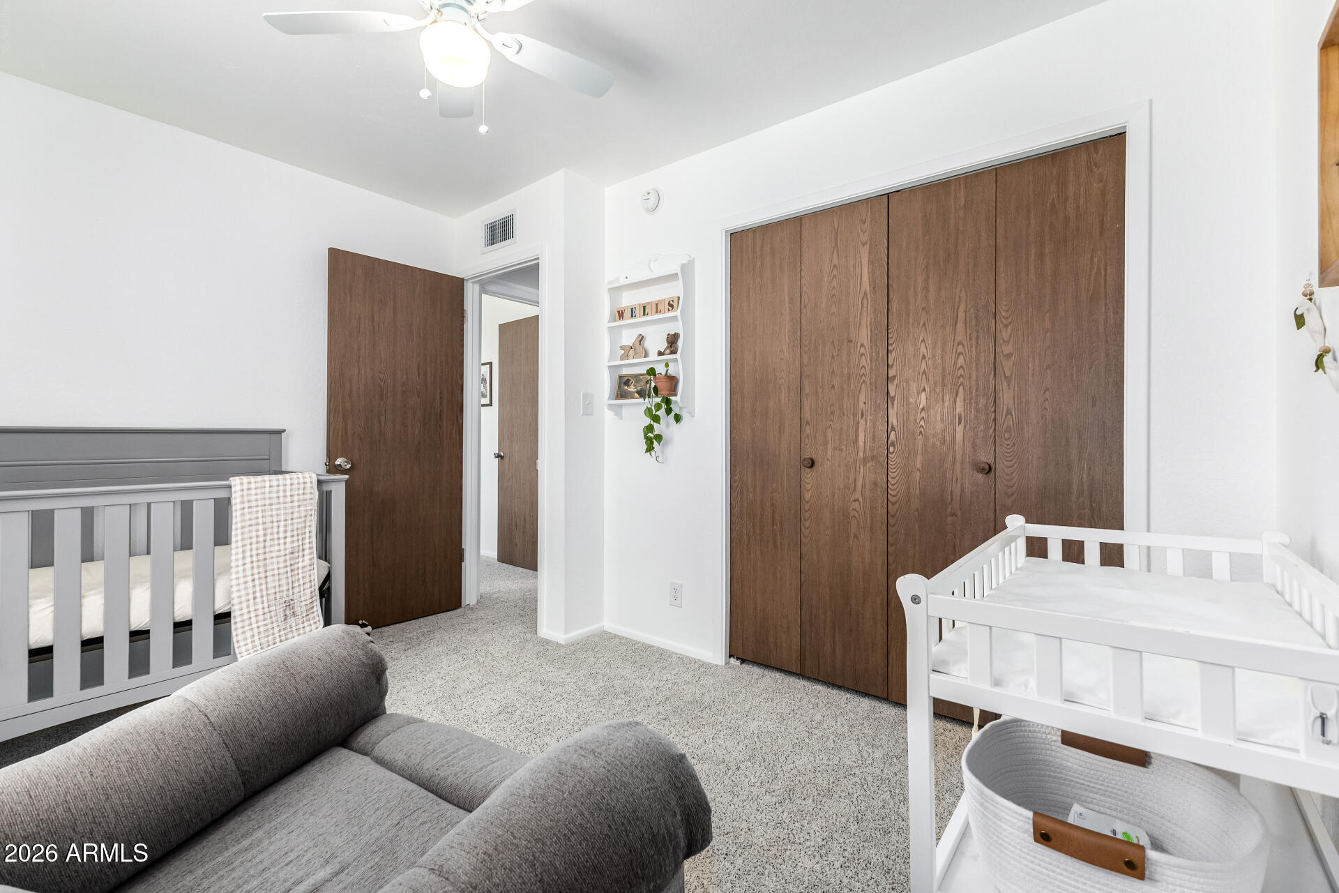 21 South Neely Street Gilbert, AZ 85233 - Photo 20 of 28 a bedroom with furniture and a table