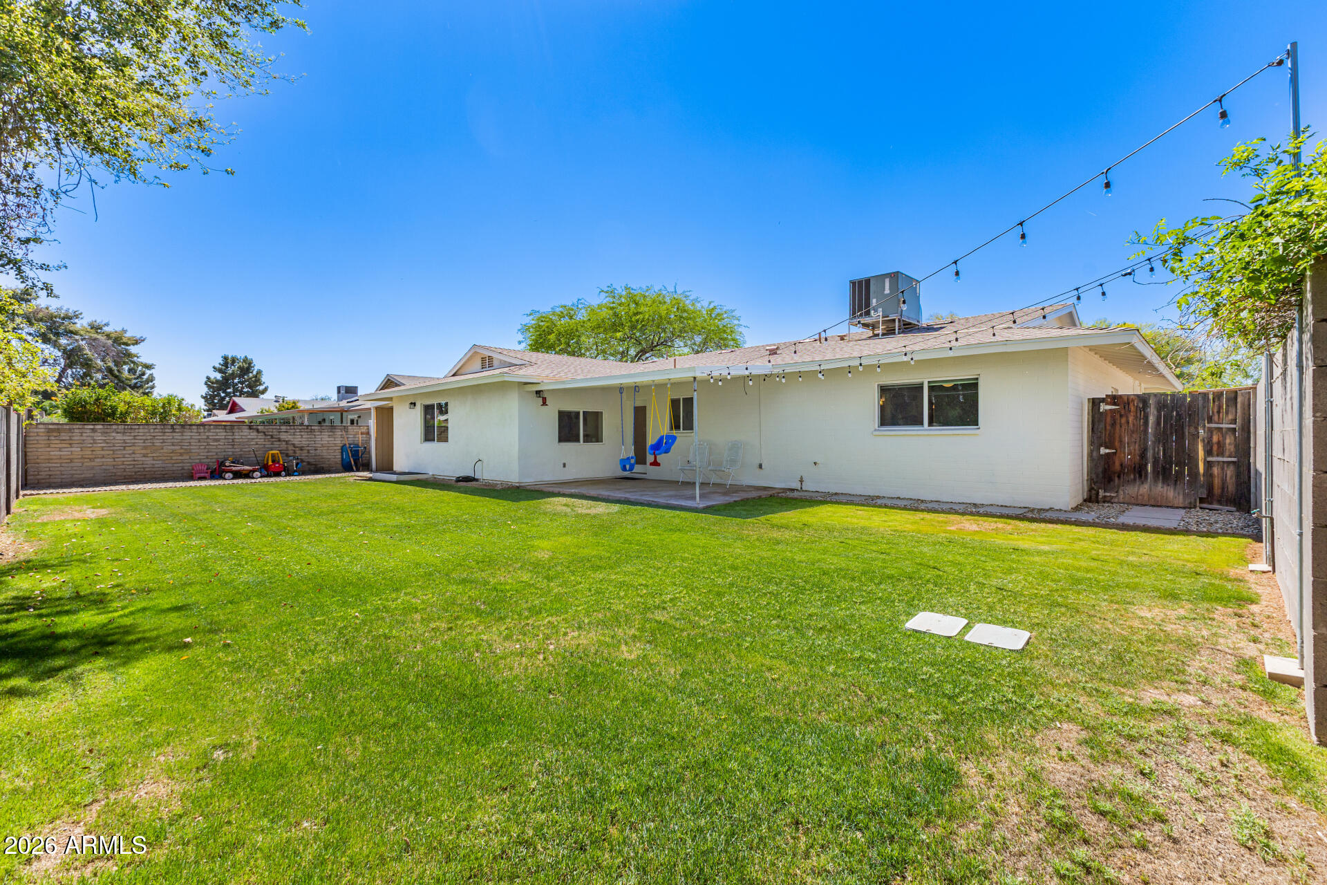 21 South Neely Street Gilbert, AZ 85233 - Photo 28 of 28 a view of a house with a backyard