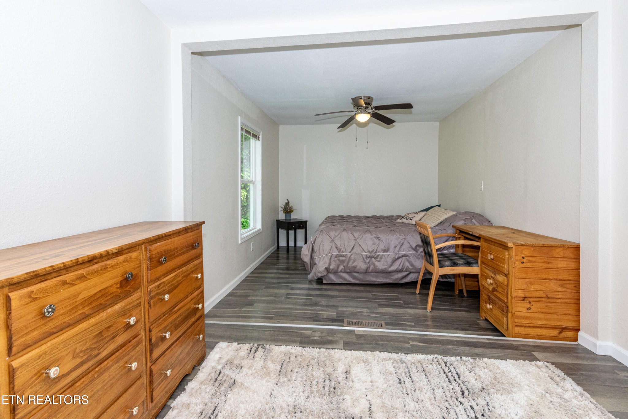 460 Lee Shirley Road Greenback, TN 37742 - Photo 12 of 29 a bedroom with a bed and a dresser