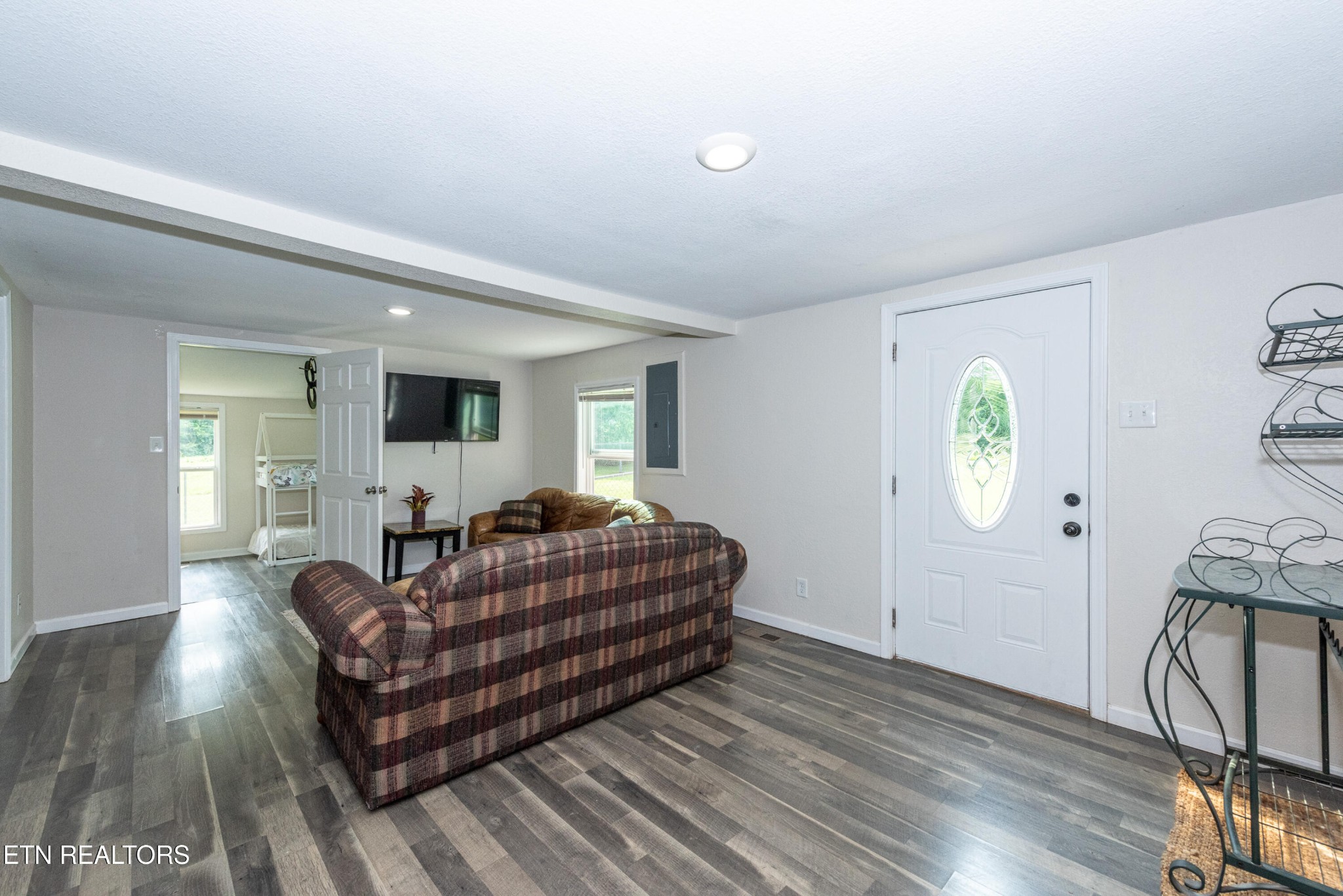460 Lee Shirley Road Greenback, TN 37742 - Photo 20 of 29 a living room with furniture and a wooden floor