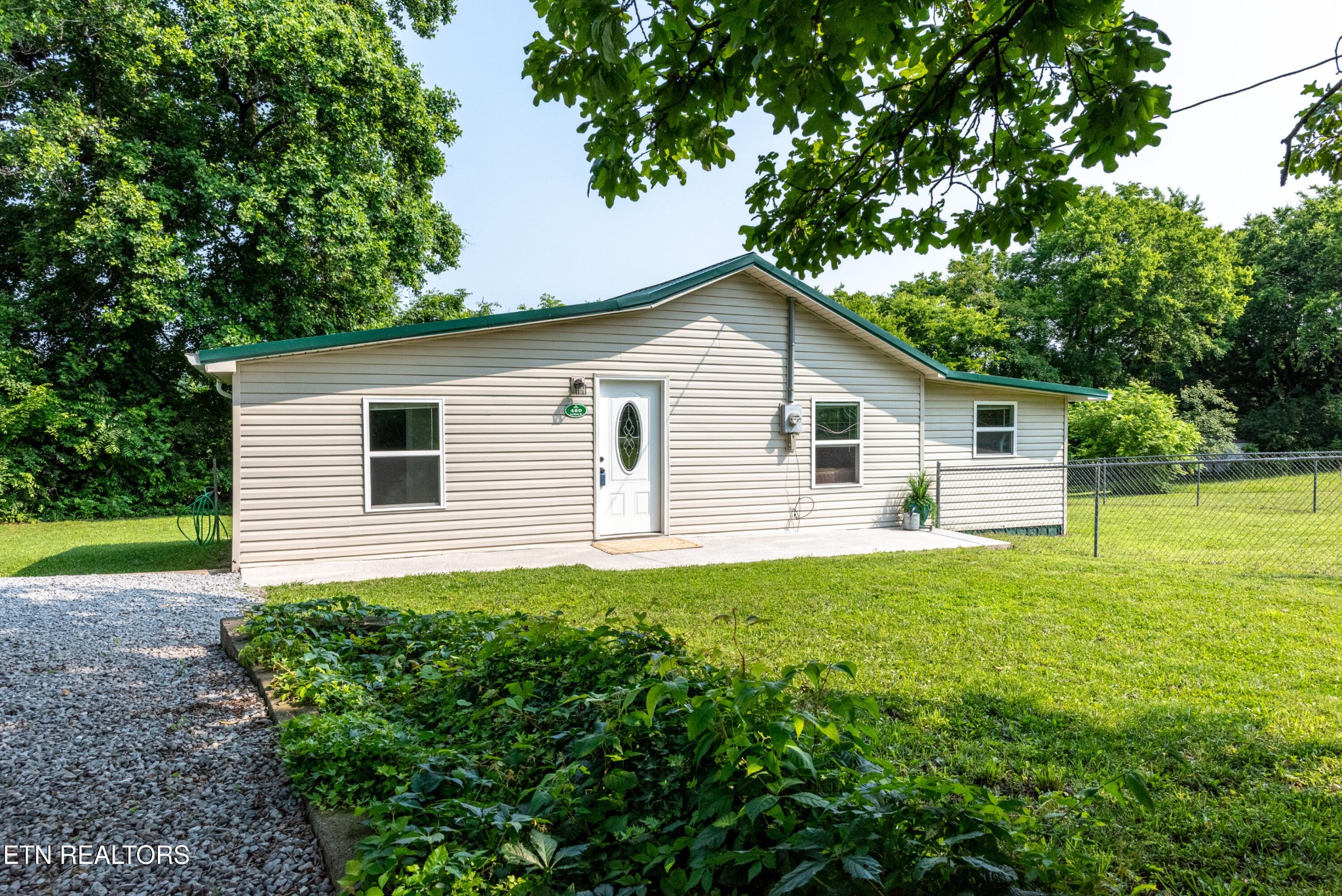 460 Lee Shirley Road Greenback, TN 37742 - Photo 29 of 29 a view of a house with backyard and garden
