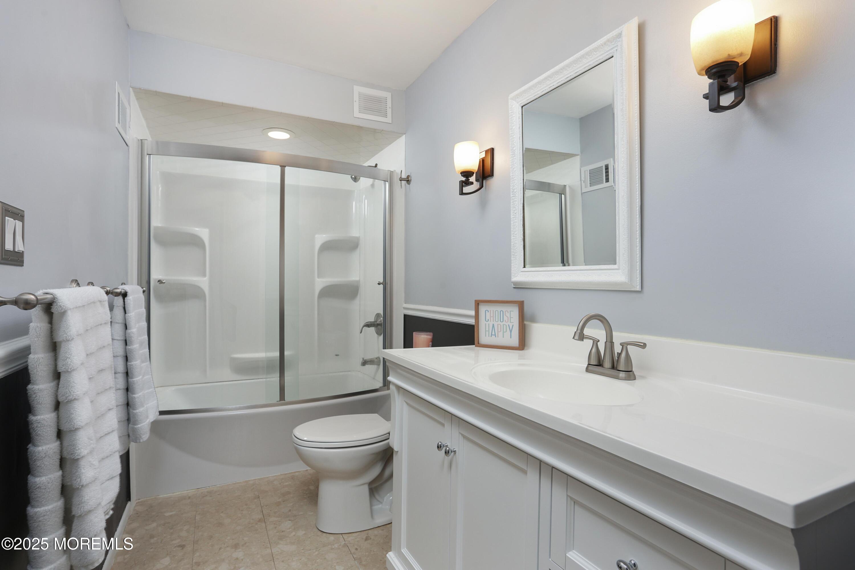 200 Portland Road, Unit C2 Highlands, NJ 07732 - Photo 8 of 22 a bathroom with a sink a toilet and shower