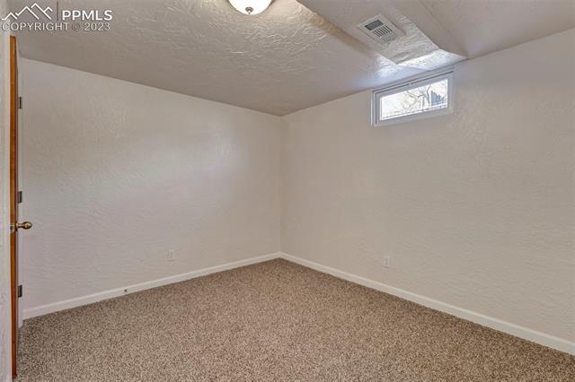534 Yellowstone Road Colorado Springs, CO 80910 - Photo 31 of 40 2nd Basement Bedroom
