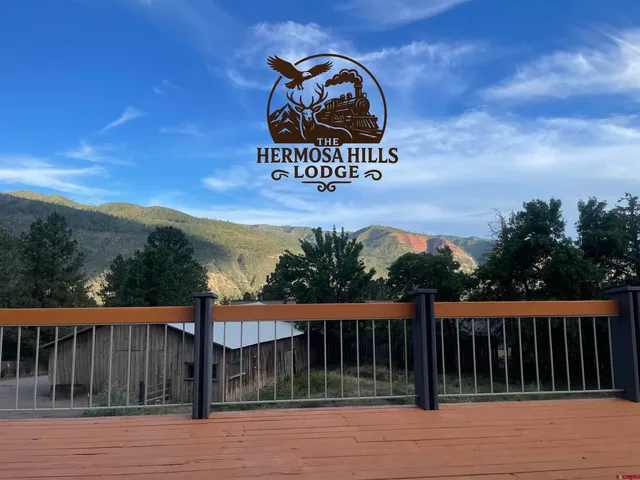 a view of a wooden fence