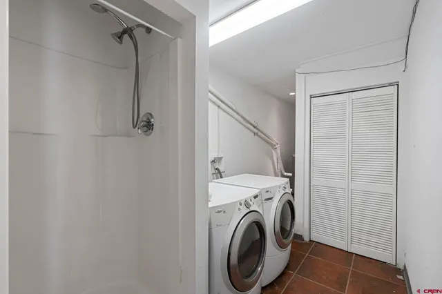 a utility room with dryer and washer