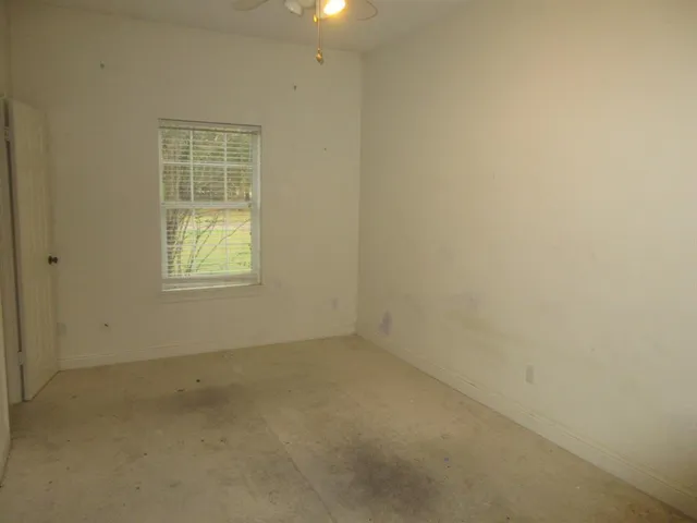 an empty room with a window