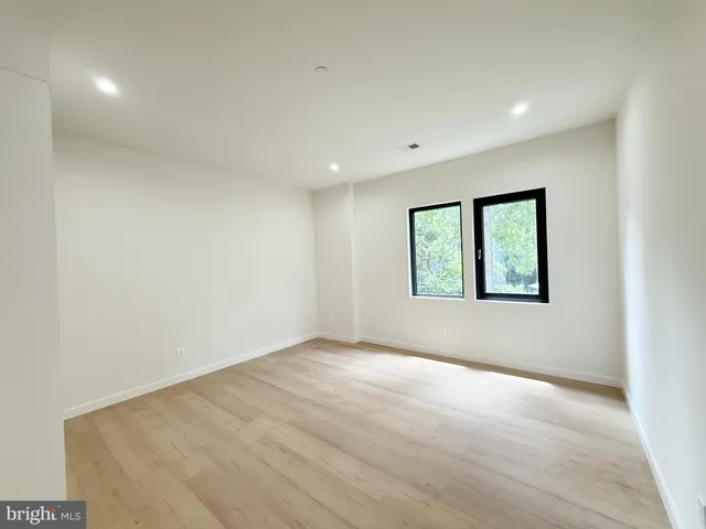 an empty room with windows