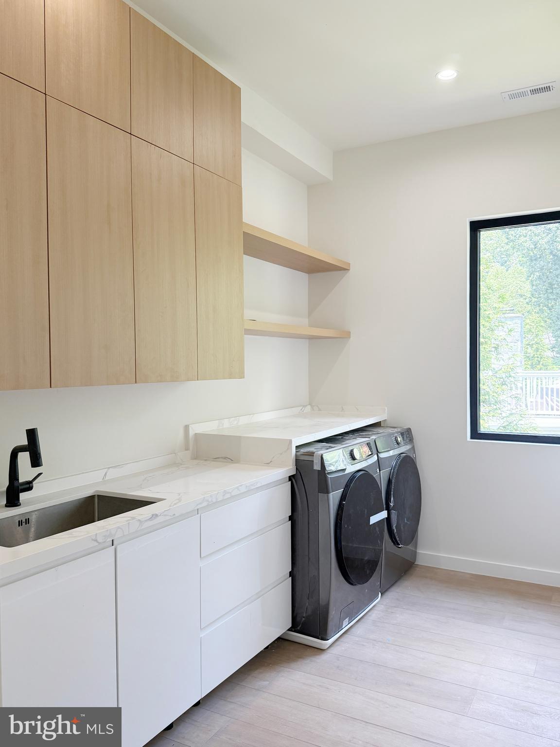 8908 Mohawk Lane Bethesda, MD 20817 - Photo 33 of 46 Upstairs laundry