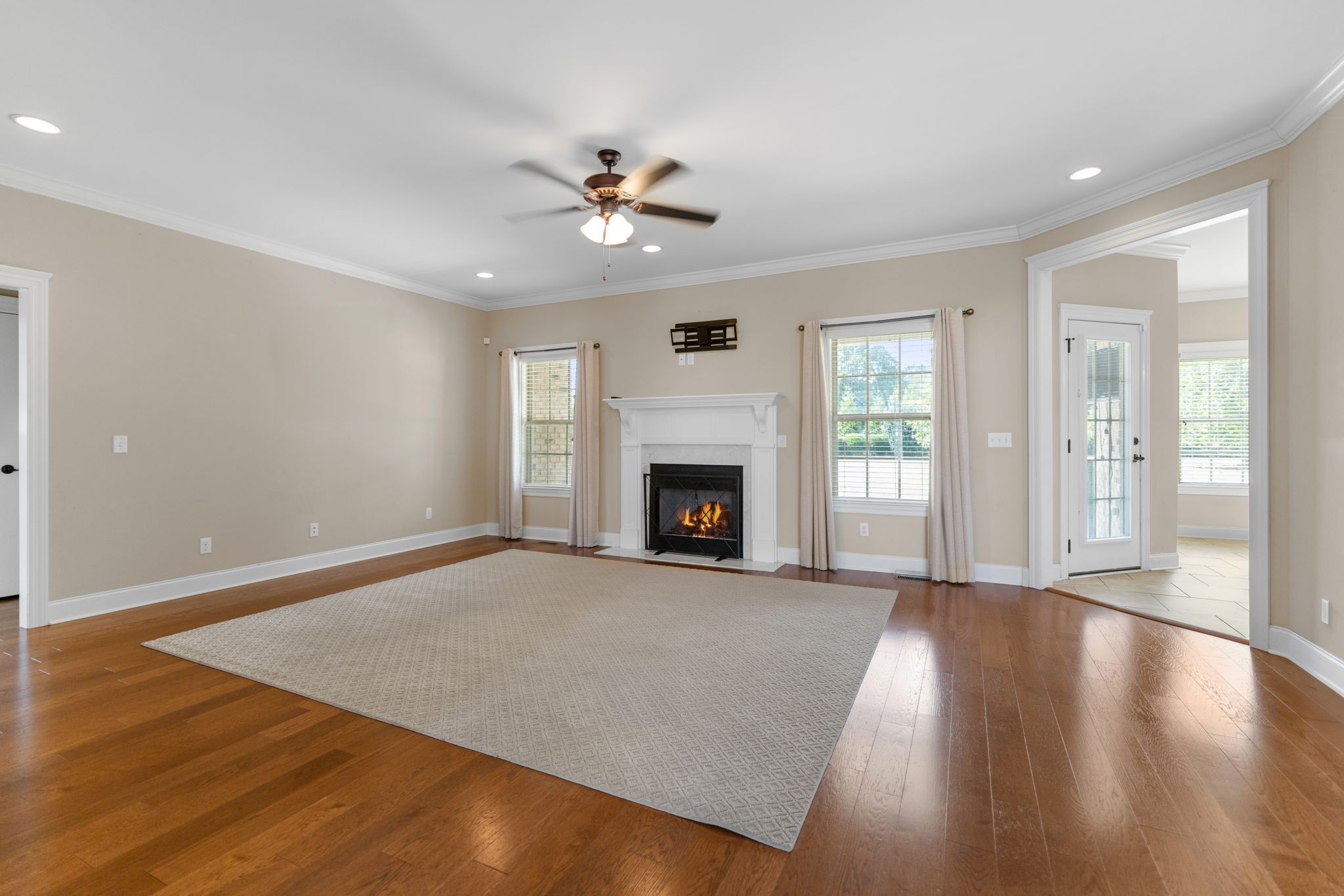 201 Hunters Ridge Drive Tullahoma, TN 37388 - Photo 8 of 45 a view of an empty room with window and wooden floor