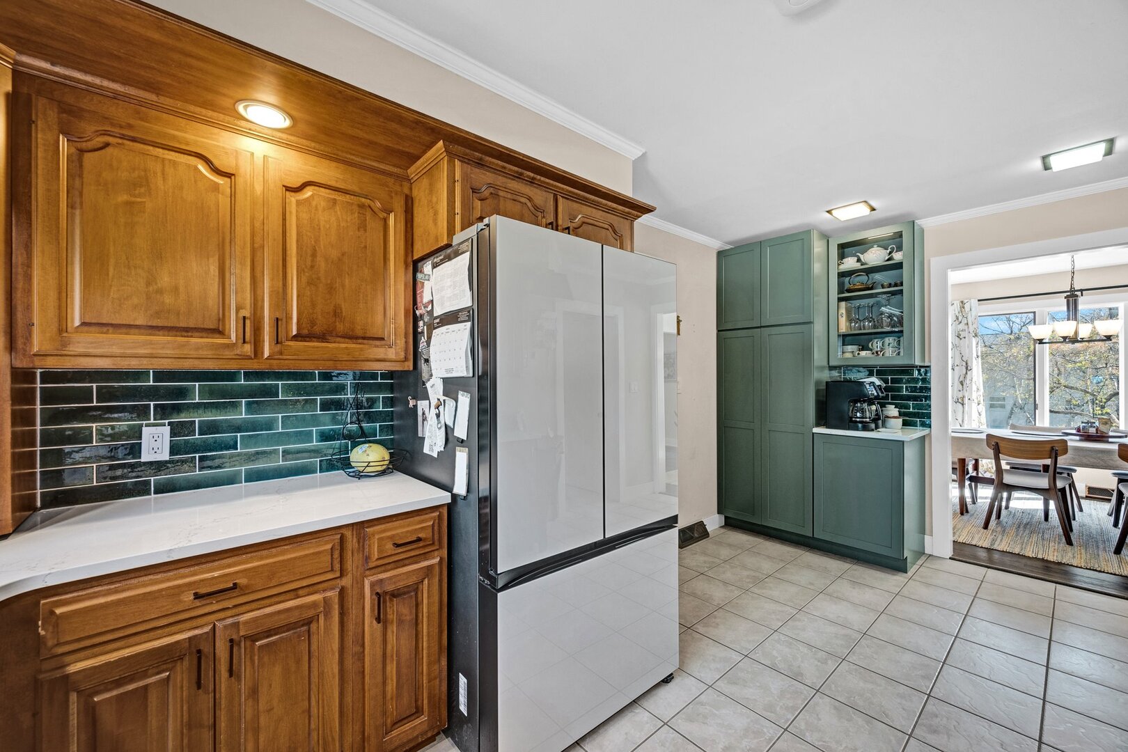903 Crestline Drive Normal, IL 61761 - Photo 11 of 35 a kitchen with stainless steel appliances granite countertop a refrigerator and a sink