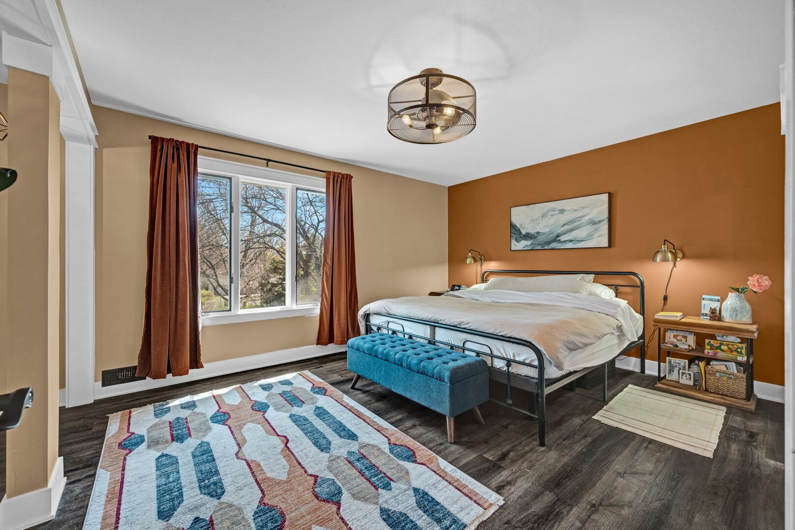 903 Crestline Drive Normal, IL 61761 - Photo 18 of 35 a spacious bedroom with a bed and a chandelier