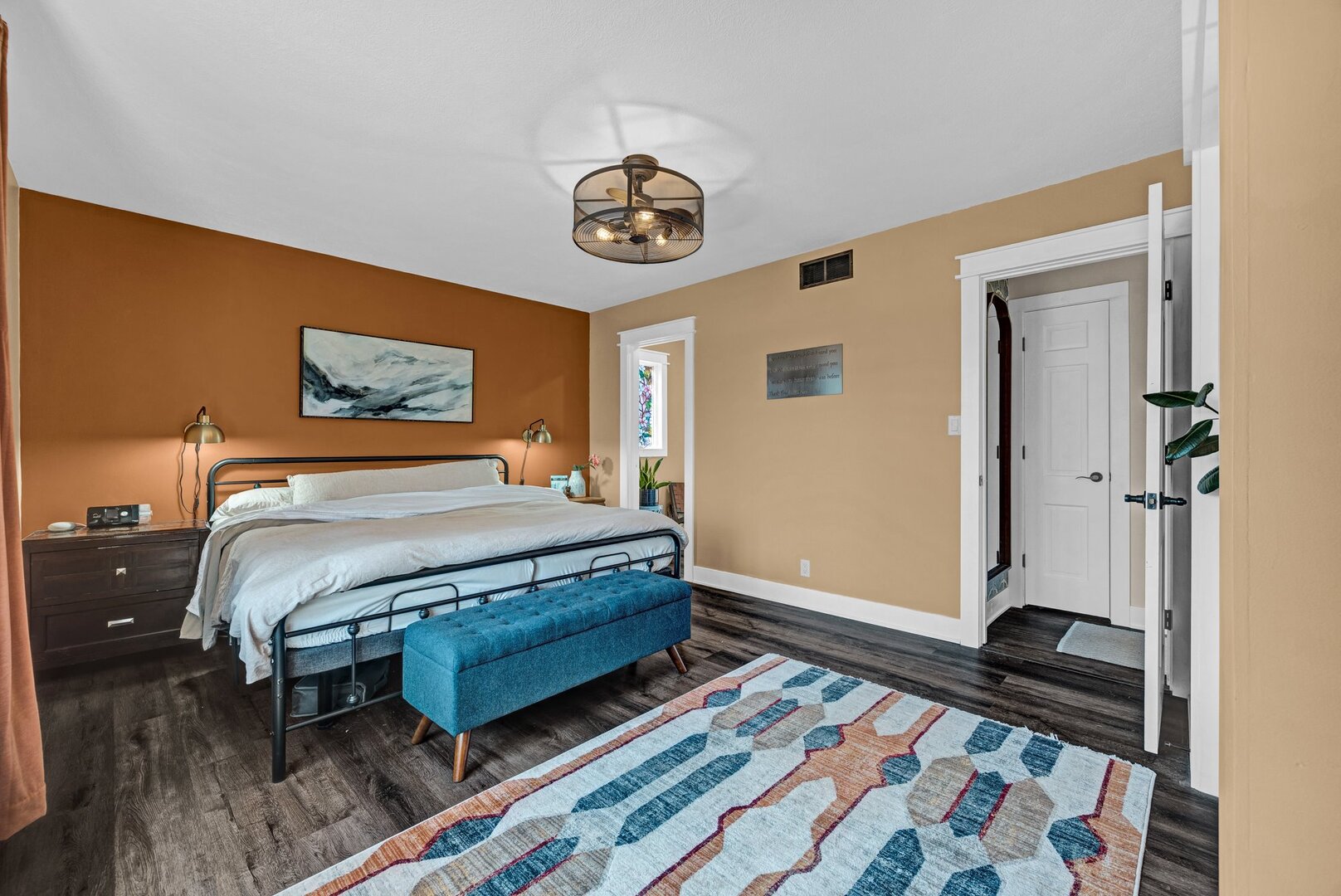 903 Crestline Drive Normal, IL 61761 - Photo 19 of 35 a bedroom with a bed and a chandelier