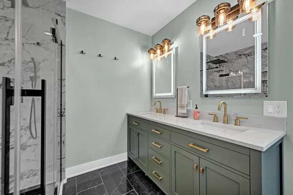 a white bath tub sitting in a bathroom