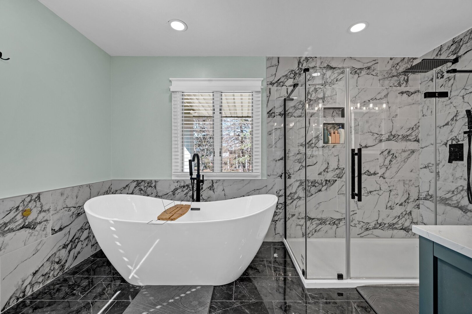 903 Crestline Drive Normal, IL 61761 - Photo 23 of 35 a white bath tub sitting in a bathroom