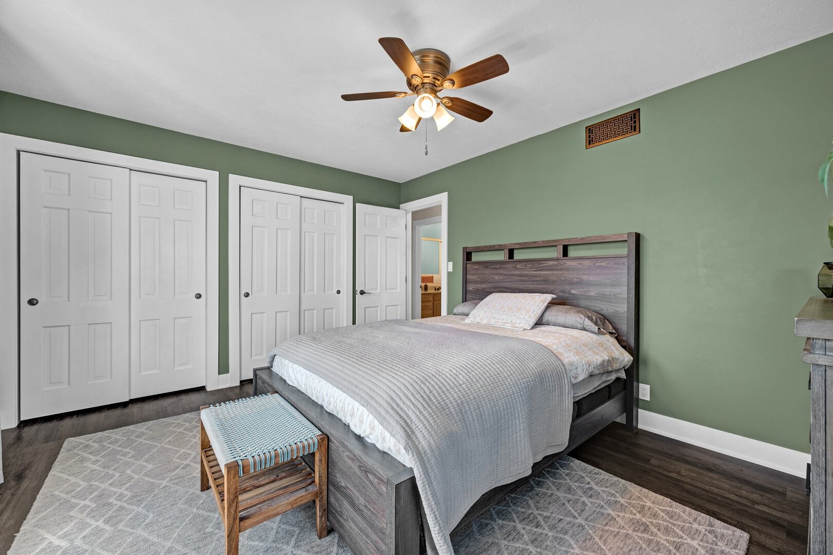 903 Crestline Drive Normal, IL 61761 - Photo 25 of 35 a bedroom with a bed and a ceiling fan