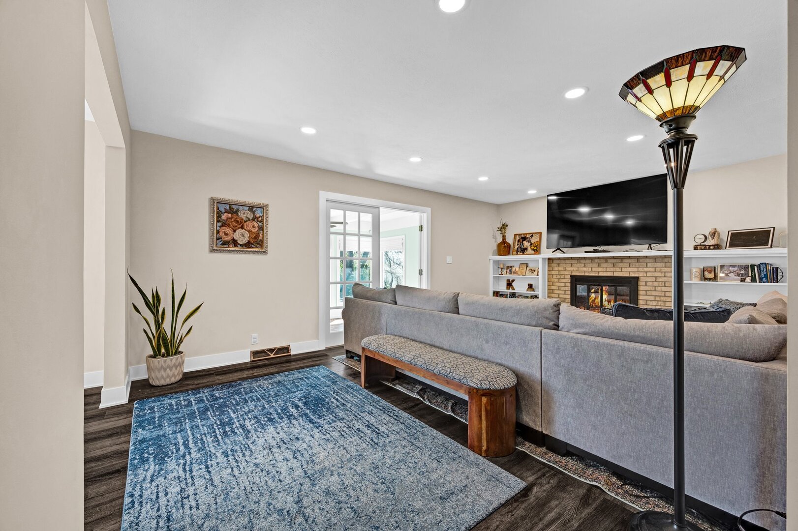 903 Crestline Drive Normal, IL 61761 - Photo 5 of 35 a living room with furniture and a flat screen tv