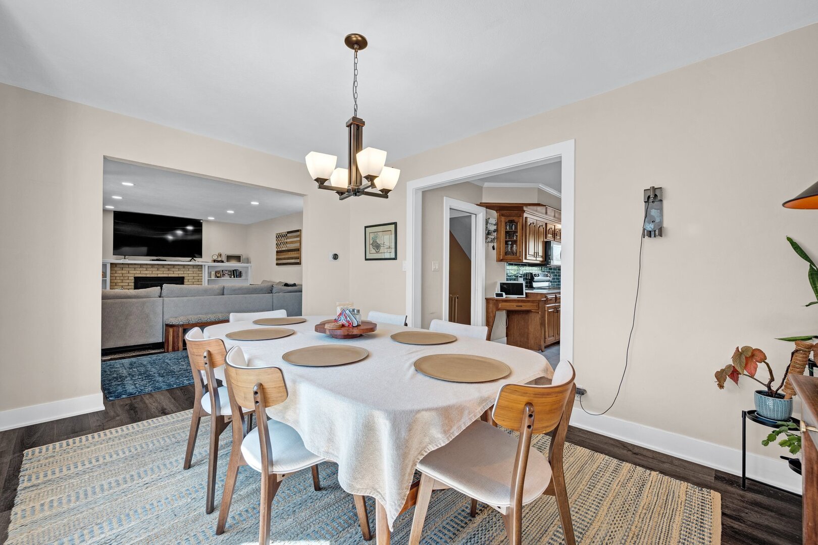 903 Crestline Drive Normal, IL 61761 - Photo 8 of 35 a view of a dining room with furniture a chandelier and wooden floor