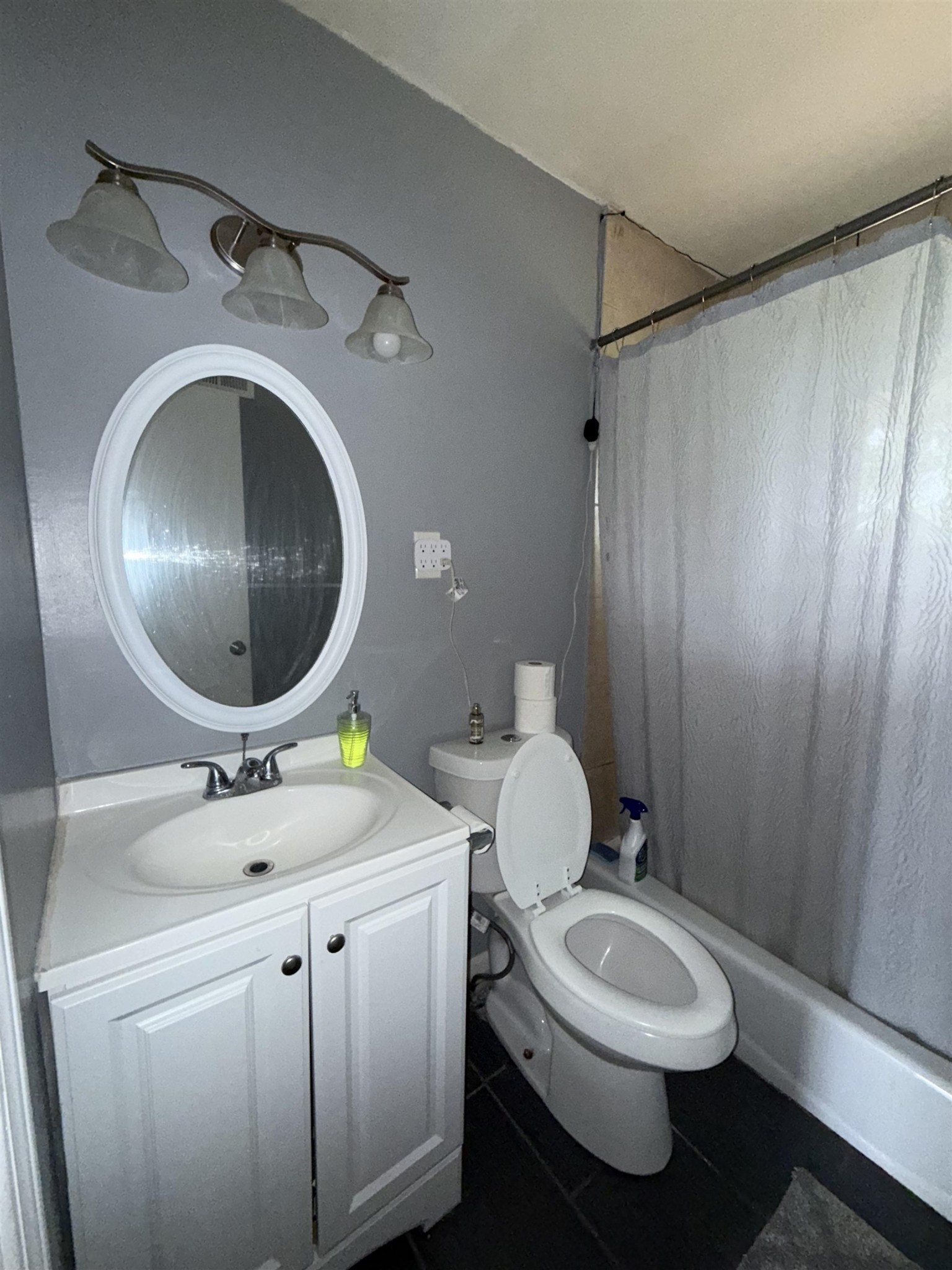 179 Ivan Road Memphis, TN 38109 - Photo 21 of 22 a bathroom with a sink mirror vanity and toilet