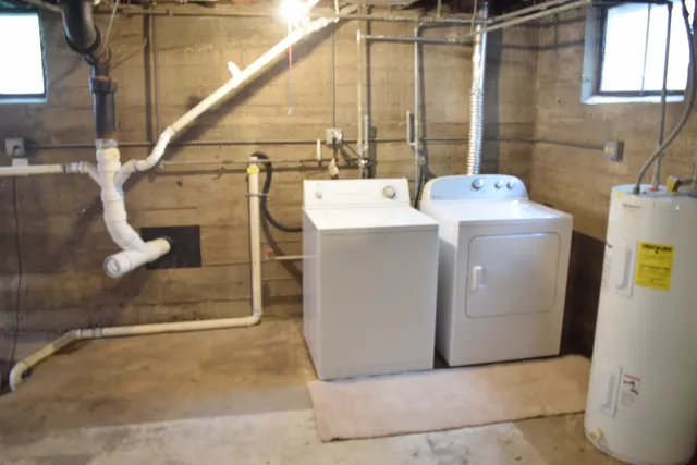 a utility room with dryer and washer