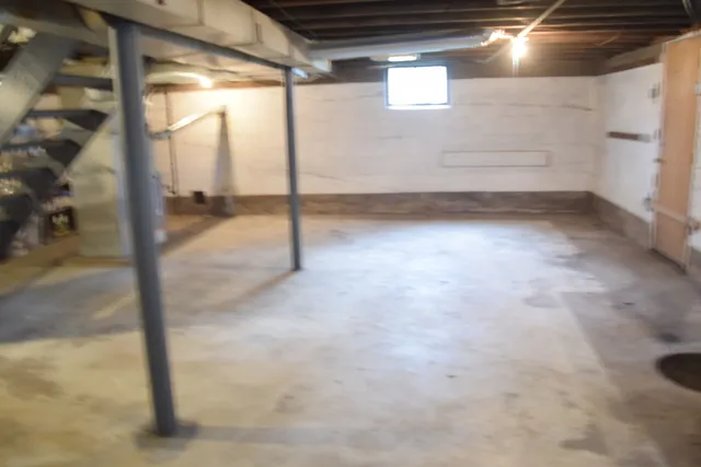 a view of a backyard with large trees