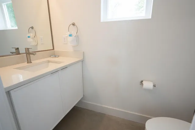 a bathroom with a sink and a toilet