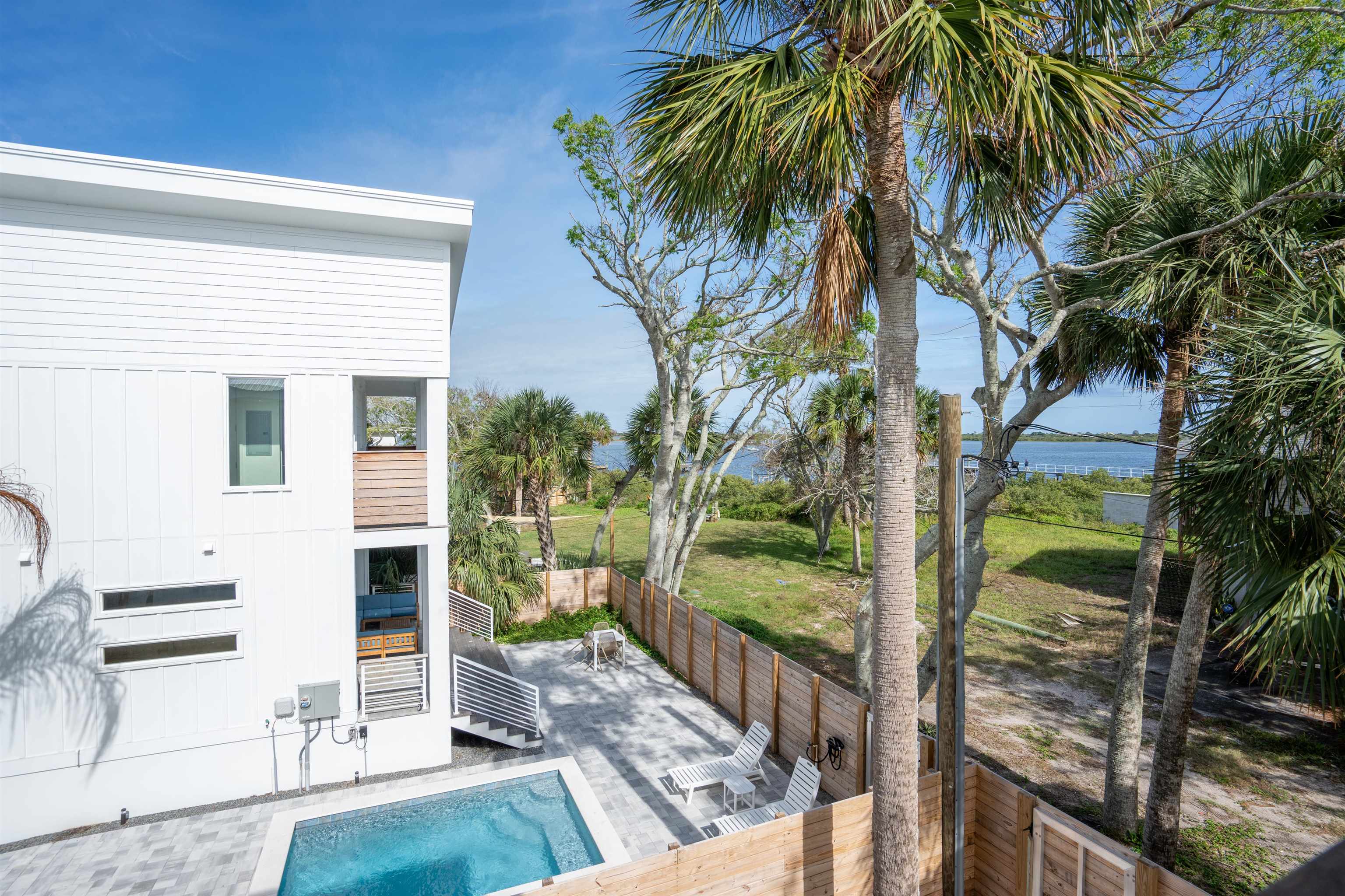 2 Sanchez Cove St. Augustine, FL 32080 - Photo 33 of 45 a view of a house with backyard and sitting area