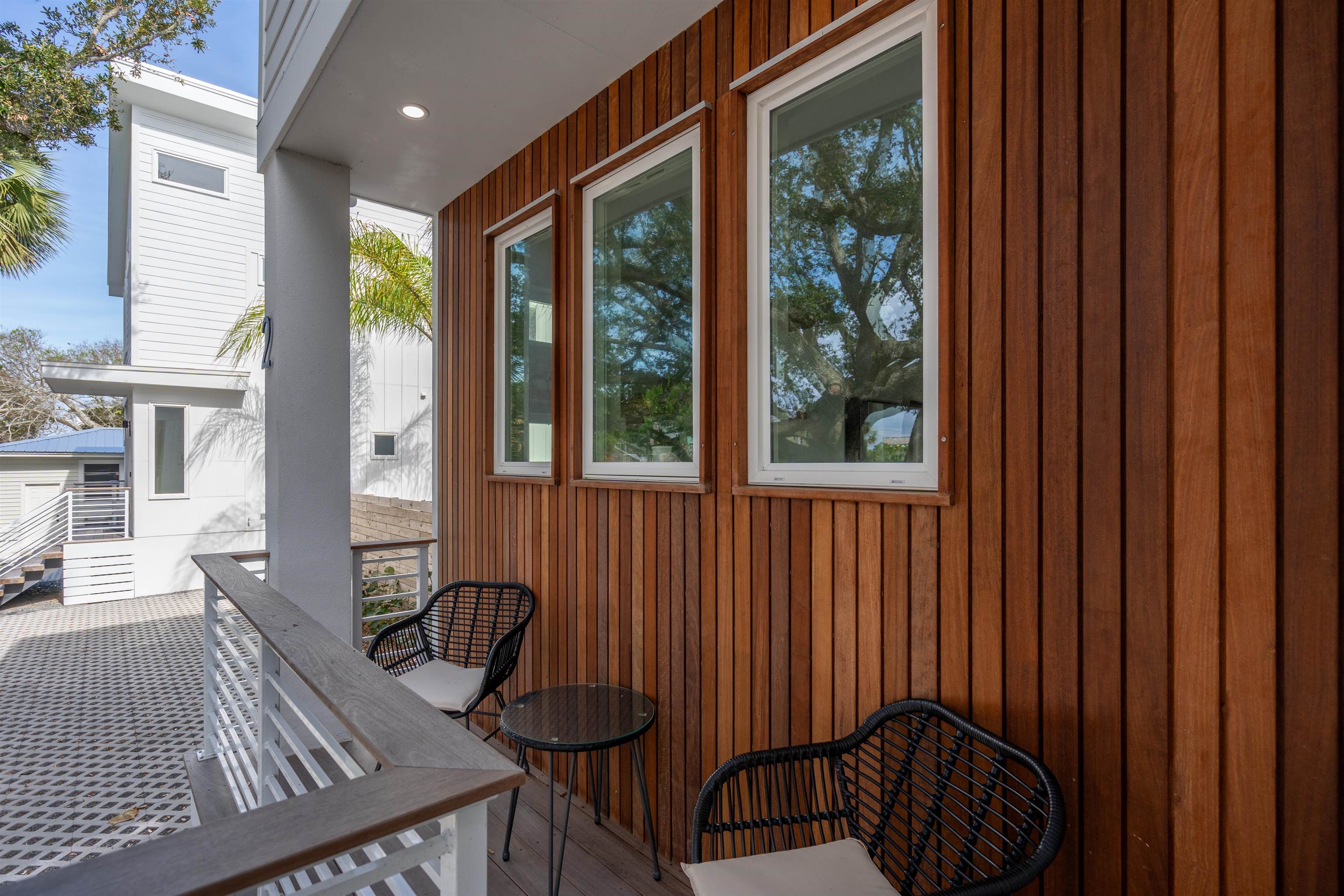 2 Sanchez Cove St. Augustine, FL 32080 - Photo 10 of 45 a view of a porch with furniture and yard